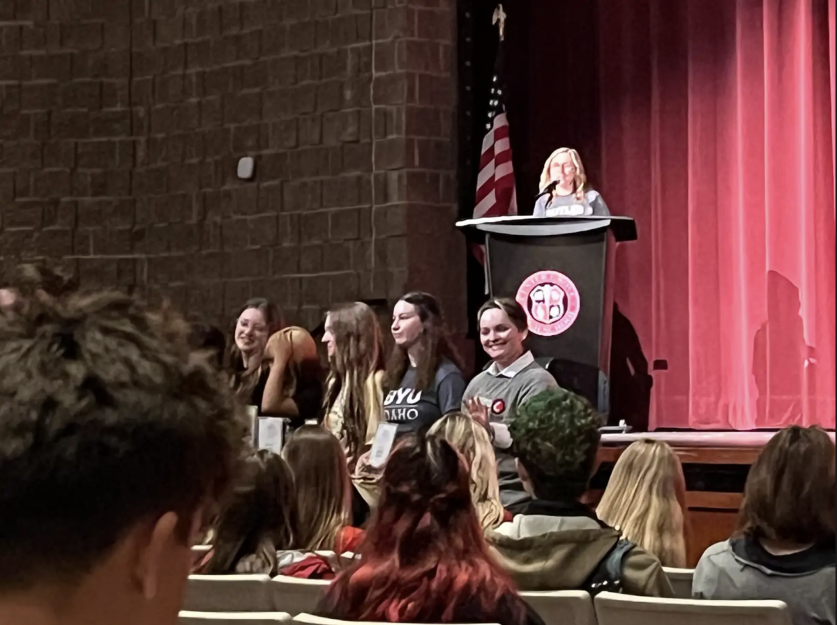 Senior Abbey Poole accepts an award at the Senior Department Awards. Students were recognized for their hard work and dedication by many departments such as the English, Math, Science, and Art departments. "[I won] outstanding fiber arts student," Poole said. "I feel happy that Mrs. Shackleford recognizes the work I've put into my art and I'm glad she pushed me this year."